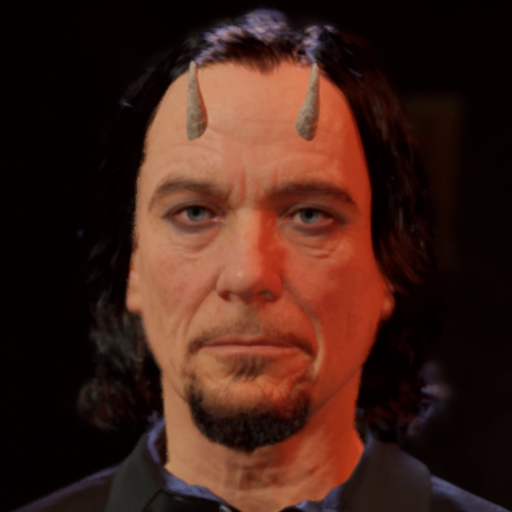 The devil — long dark hair, horns, black shirt — staring straight at you